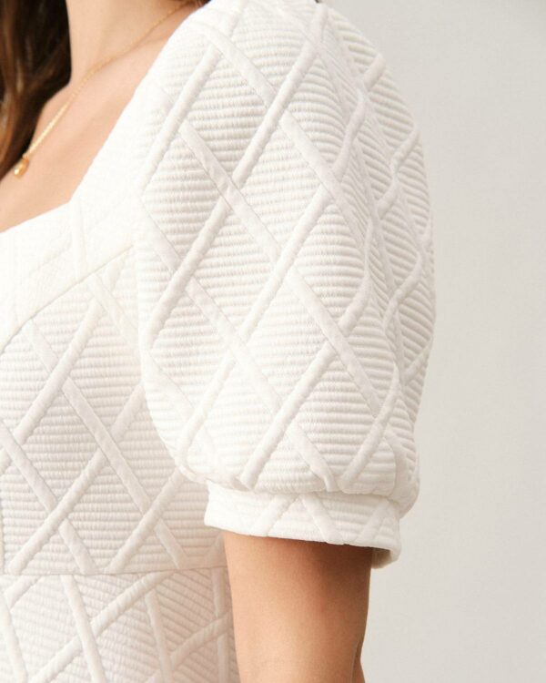 The Solid Textured Puff Sleeve Mini Dress - Image 2
